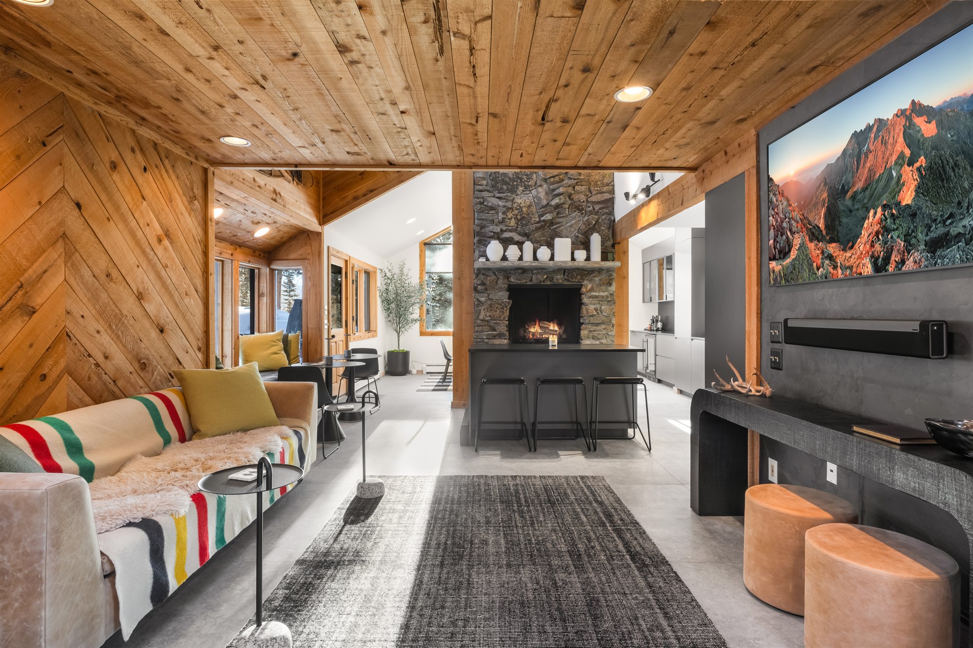 The Great Room looking through to the hearth, TV wall and chevron panelling